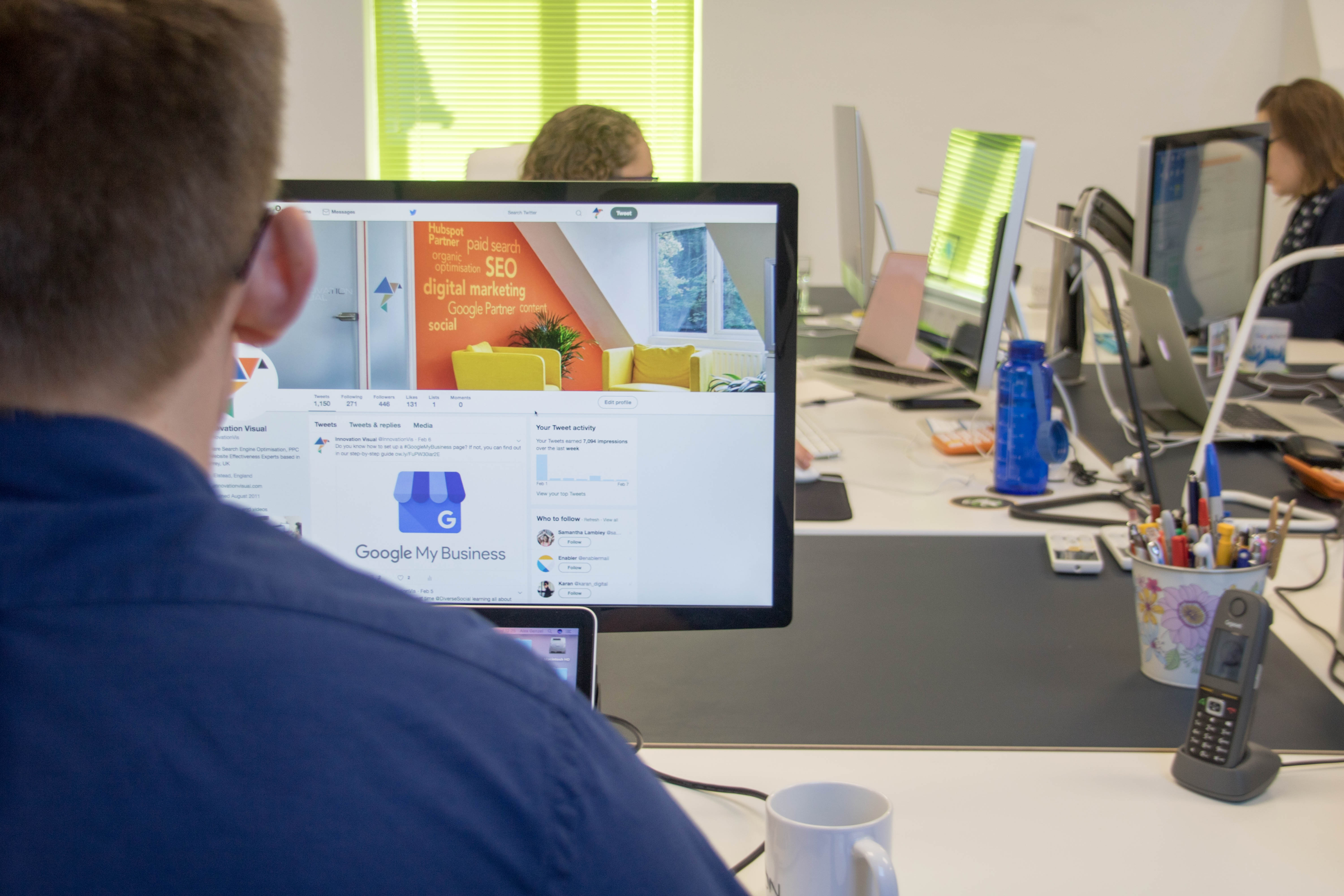 Person looking at the Innovation Visual brand on a computer screen